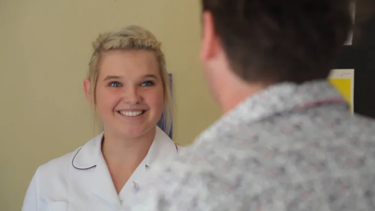 Dental nurse chatting with a patient