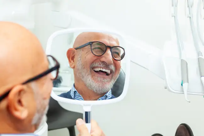 happy man with implant