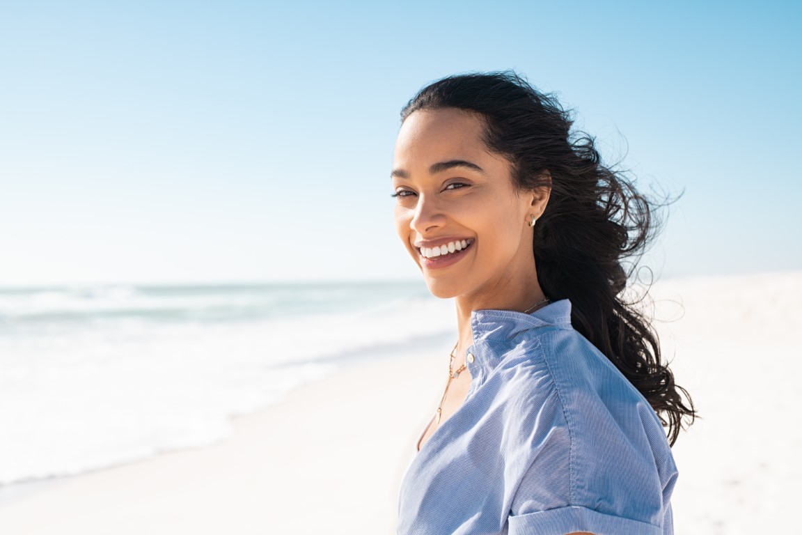 Woman smiling on beach